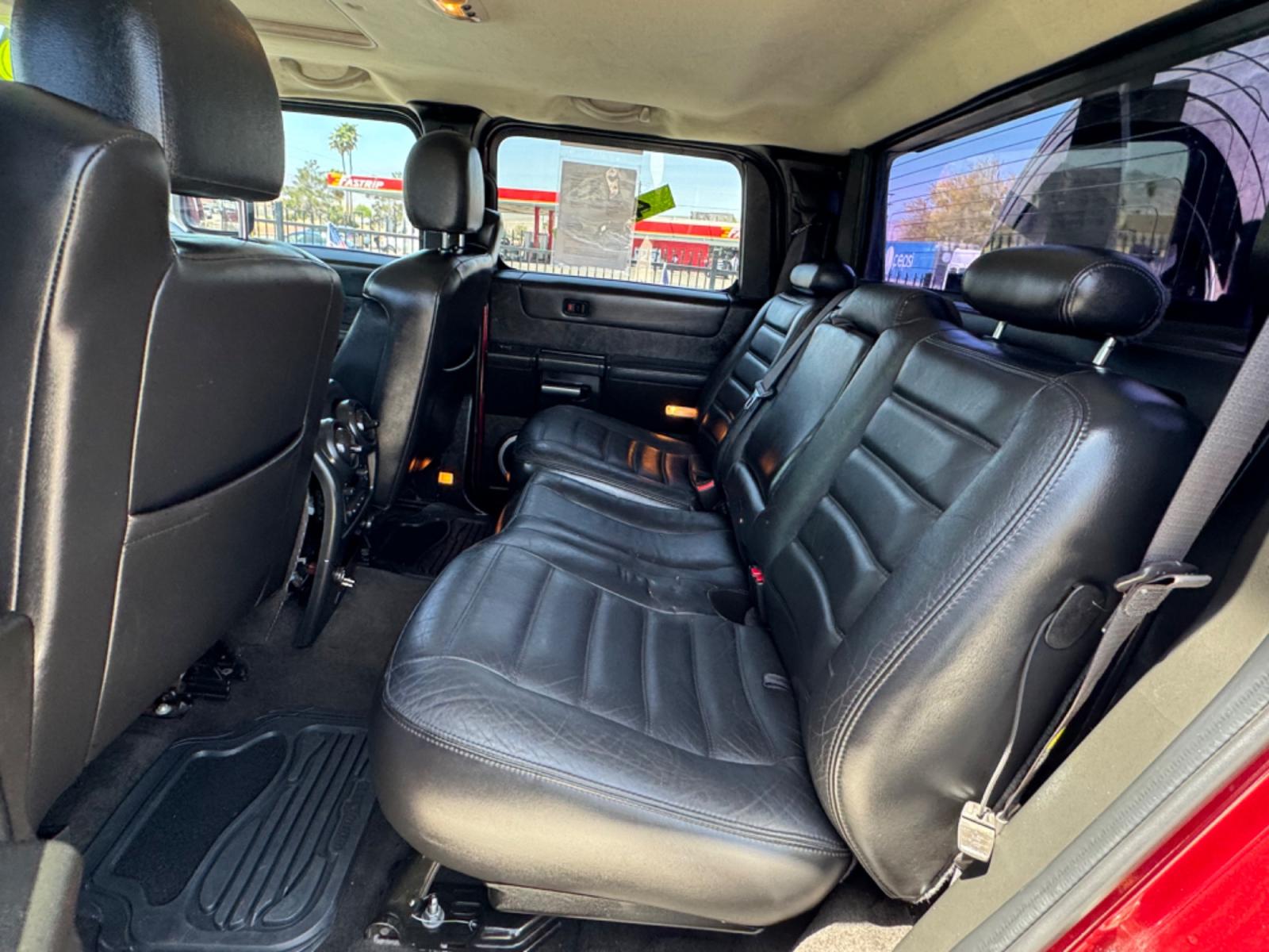 2005 Red /black Hummer H2 SUT , located at 2190 Hwy 95, Bullhead City, AZ, 86442, (928) 704-0060, 0.000000, 0.000000 - 2005 Hummer H2 SUT. only 92k miles. 6.0 V8 4 wheel drive. New transmission with warranty. New shocks. lots of extras .onstar. backup camera, custom stereo. fabtech 6 in lift with 40 in tires. Big Bad Hummer. $22900. Free and clear title. - Photo #11
